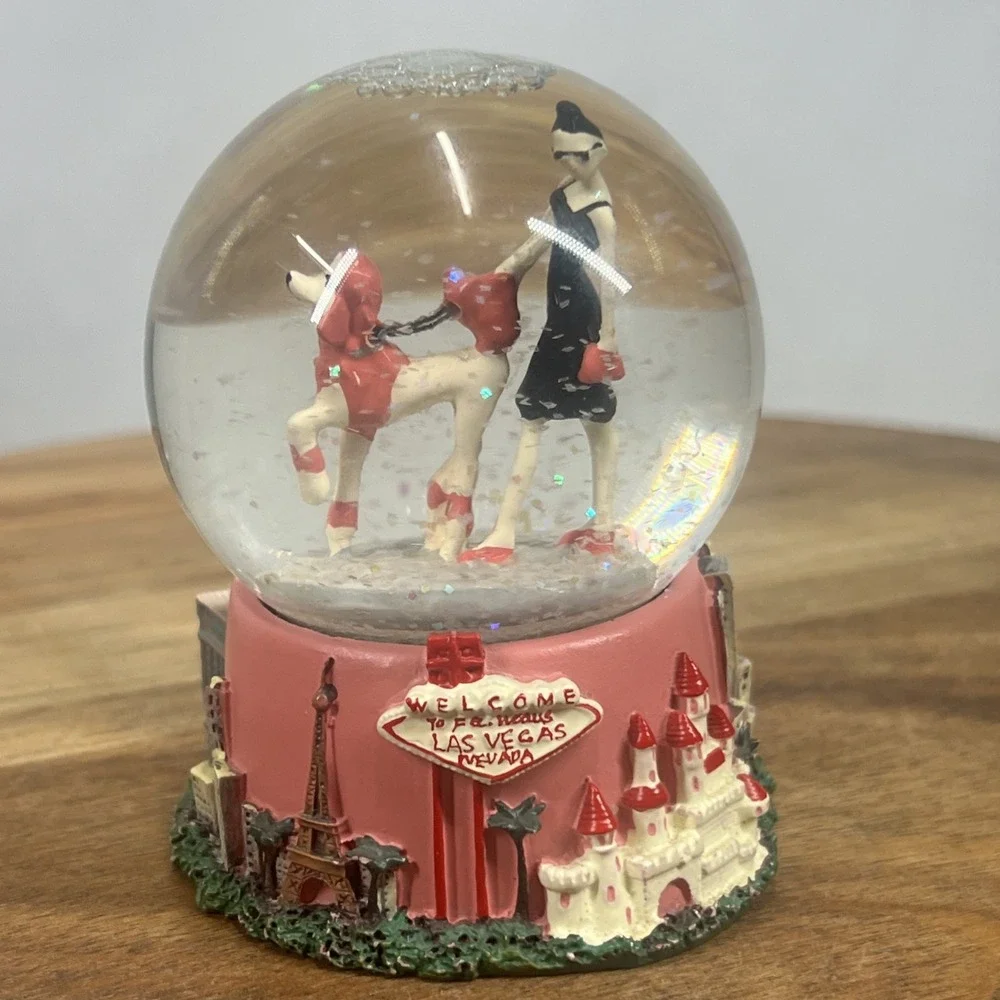 Las Vegas Glitter Snow Globe Landmarks 3.5 Inch.  Woman With Dog Figurine.‎
